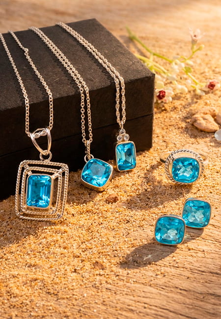 Sky Blue Summers: How to Style Topaz Jewelry in the Heat