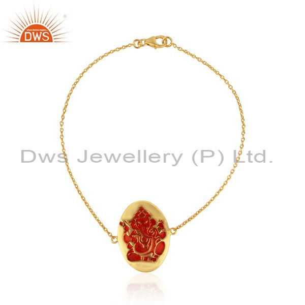 Designer ganesha bracelet in yellow gold on silver and red enamel