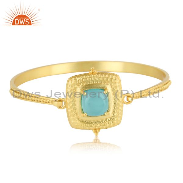 Bold hammered fashion cuff with gold on and aqua chalcedony