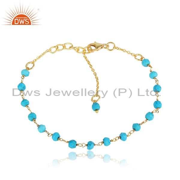 Handcrafted turquoise bead bracelet in yellow gold on silver