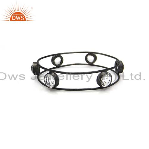 Handcrafted sterling silver with oxidized crystal quartz bangle