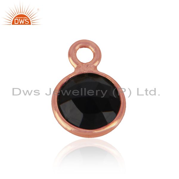 Jewelry charm made of rose gold on silver 925 and black onyx