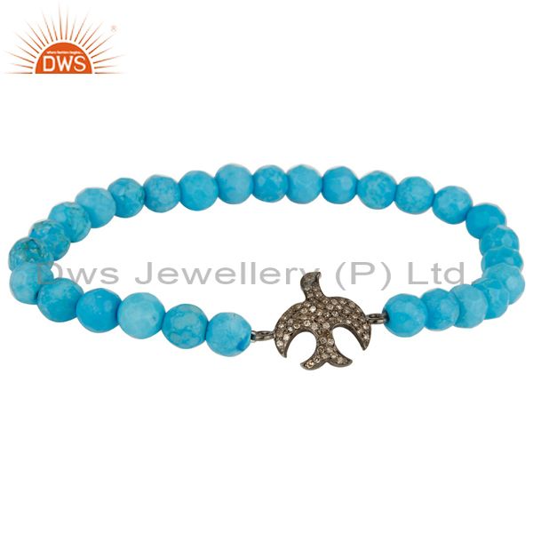 Pave set diamond silver flying bird charm turquoise gemstone adjustable bracelet