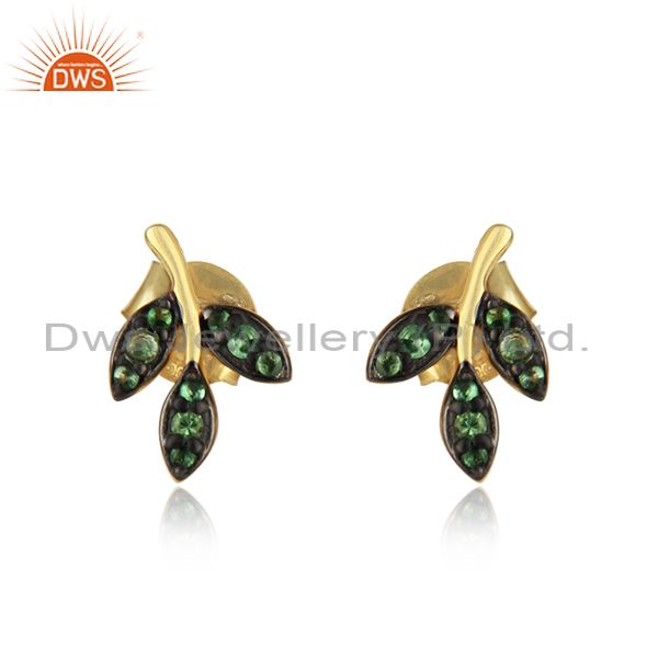 Minimal leaf stud in yellow gold on silver with pave tsavorite