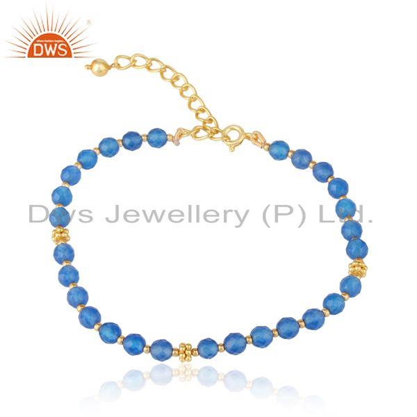 Designer blue chalcedony bead bracelet in yellow gold on silver