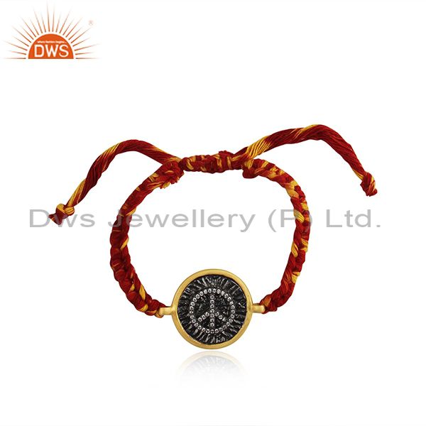 Peace sign gold and rhodium plated silver cz bracelet