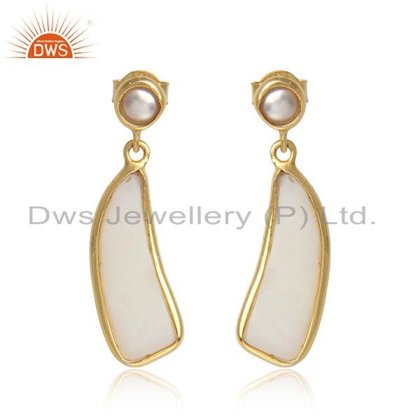 Handcrafted organic shape dangle in yellow gold on silver with pearl
