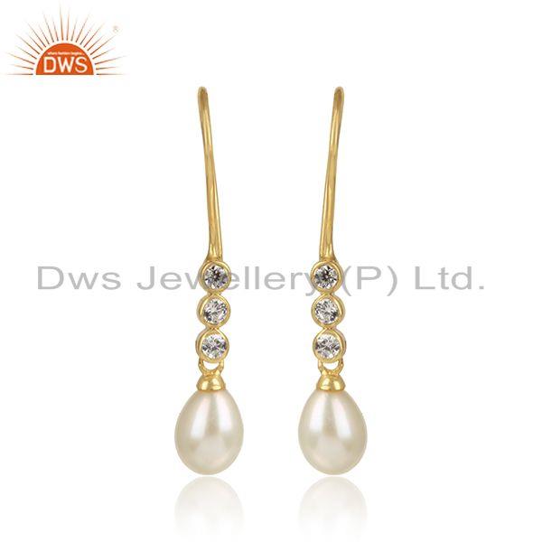 Handcrafted dainty pearl earring in yellow gold on silver and cz
