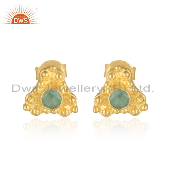 Handmade designer earring in yellow gold on silver with emerald