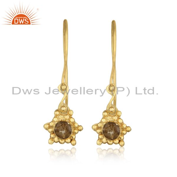 Designer dangle earring in yellow gold on silver studded with citrine