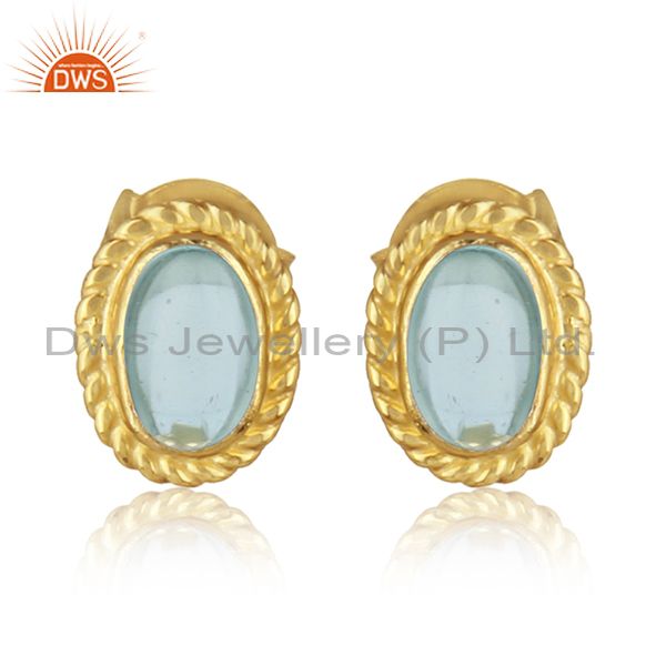 Handmade silver 925 earring with blue topaz and yellow gold on