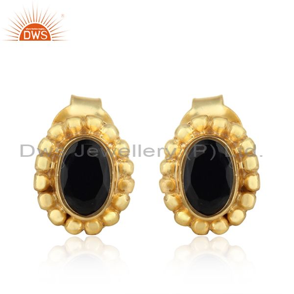 Textured dainty stud in yellow gold over silver with black onyx