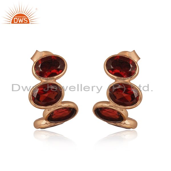 Designer curved 3 stone rose gold on silver earring with garnet