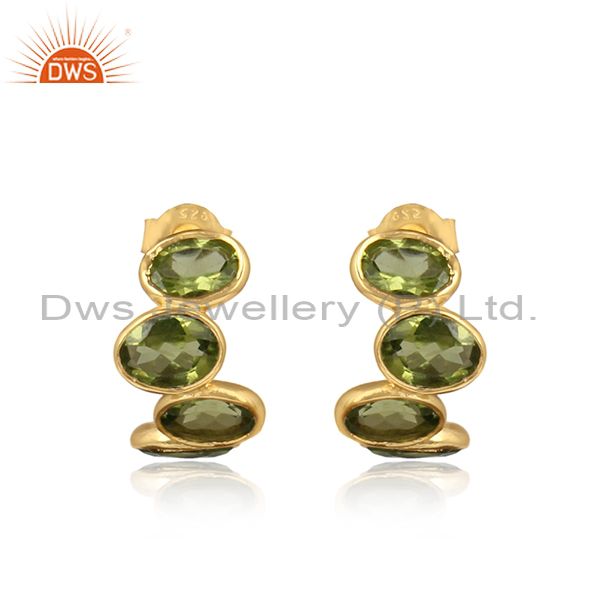 Designer curved 3 stone yellow gold on silver earring with peridot