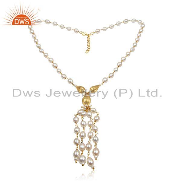 Traditional handmade bead necklace in gold over silver with pearl