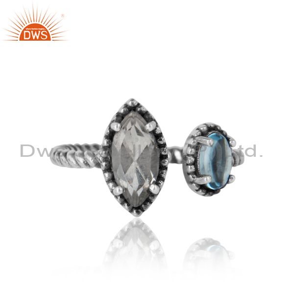 Twisted designer oxidized ring in silver blue topaz and crystal