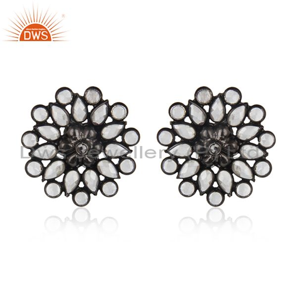 Designer floral studs in black rhodium on silver with white zircon