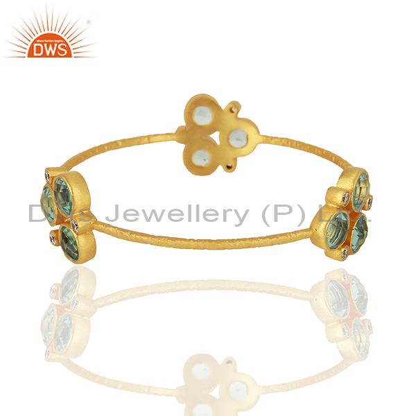 Supplier of Designer gold plated blue topaz gemstone fashion bangle supplier