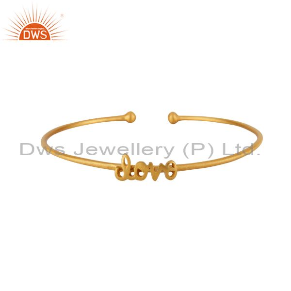 Supplier of 22k yellow gold on sterling silver matte finish love torque bangle