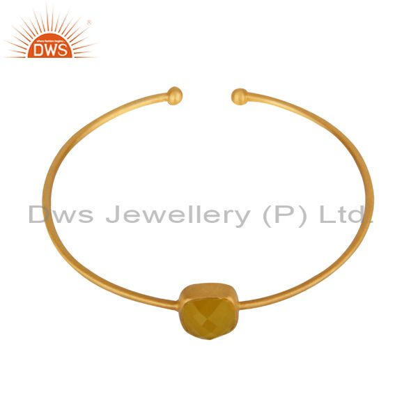 Supplier of 18k yellow gold plated 925 silver yellow moonstone torque bangle