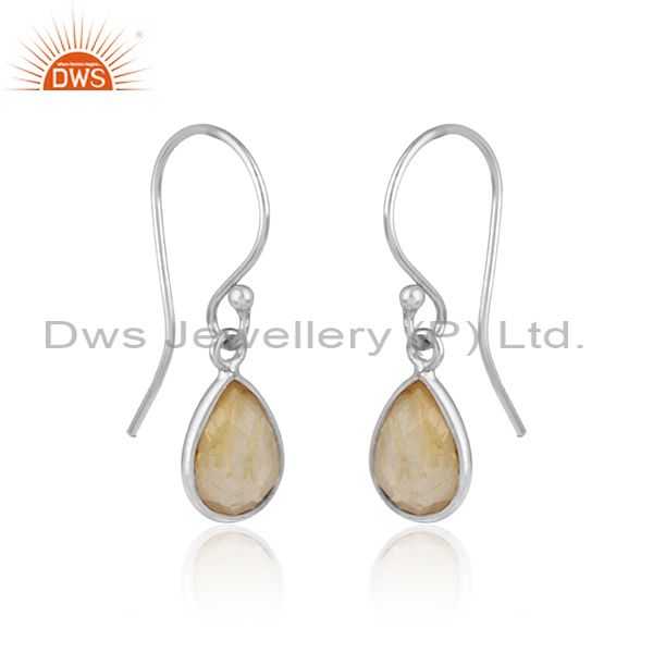 Handcrafted dangle earring in sterling silver with golden rutile