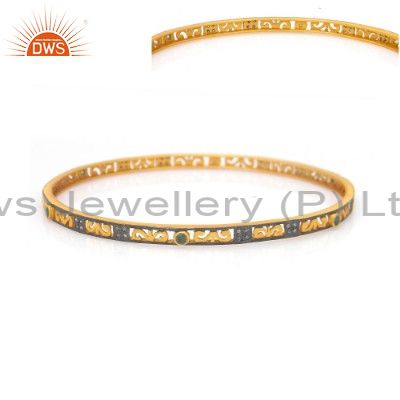 Supplier of 18k yellow gold on 925 silver green cubic zirconia fashion bangle