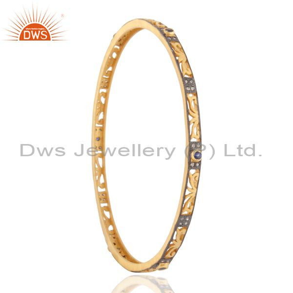 Supplier of Pave diamond 18k gold blue sapphire gems 925 silver sleek bangle