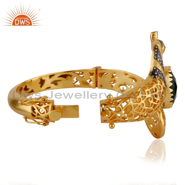 Supplier of 18k gold on unique peacock design openable bangle green glass cz