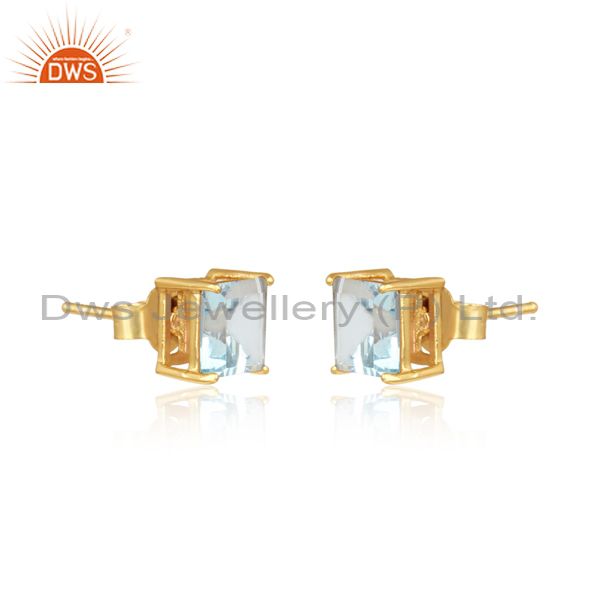 Handcrafted dainty gold on silver studs with blue topaz