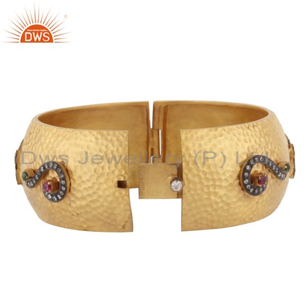 Supplier of Matte finish 18kt gold plated hand hammered cubic zirconia bangle