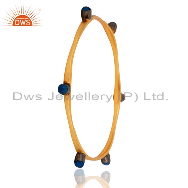 Supplier of 18-carat yellow gold plated blue chalcedony gemstone womens bangle