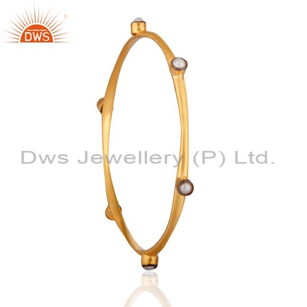 Supplier of 4mm cab round natural pearl 24k yellow gold on wide classic bangle