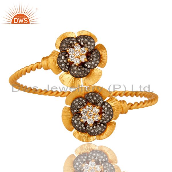 Supplier of 18k yellow gold over 925 silver twisted wire flower bangle with cz