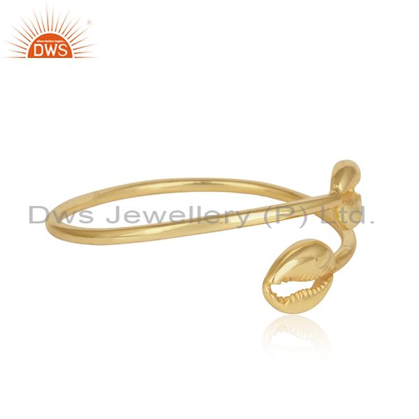 Designer cowrie sleek bypass cuff in yellow gold on silver 925