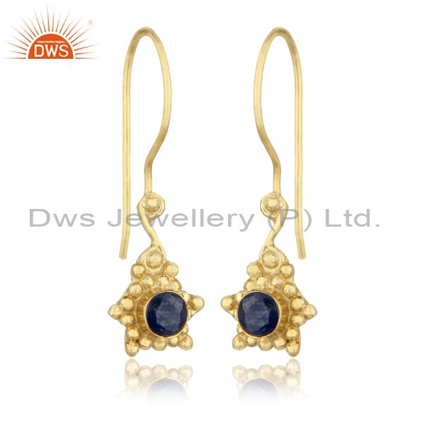 Handmade earring in yellow gold over silver and blue sapphire