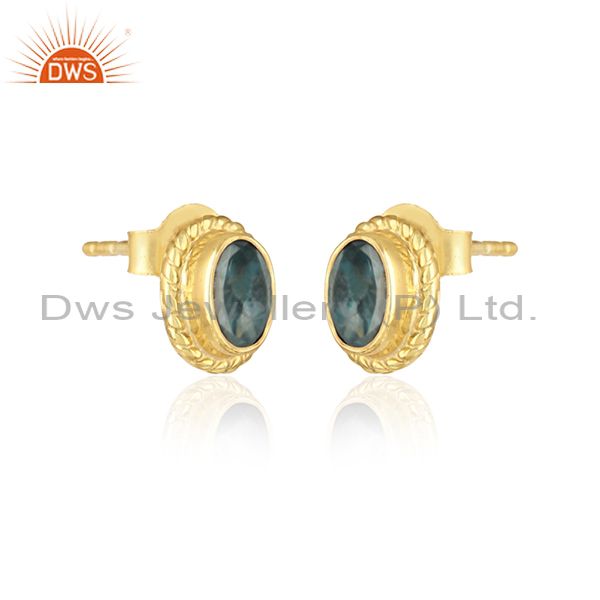 Handmade silver earring with london blue topaz and yellow gold on
