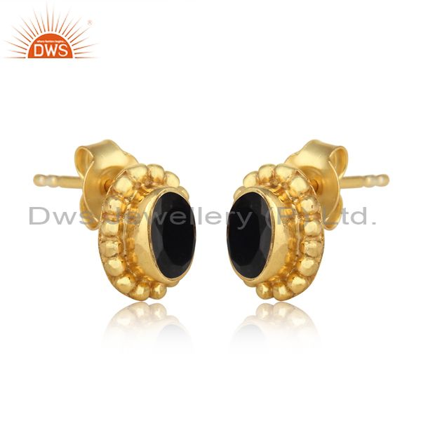 Textured dainty stud in yellow gold over silver with black onyx