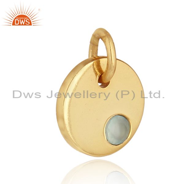 Dainty charm pendant in yellow gold on silver with aqua chalcedony