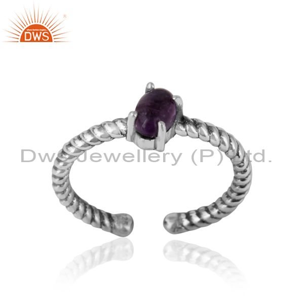 Dainty oxidized silver ring adorn with tilted natural amethyst