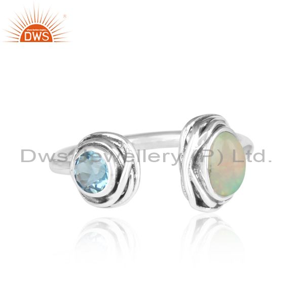 Ethiopian Opal Cabushion And Blue Topaz Silver Facing Ring