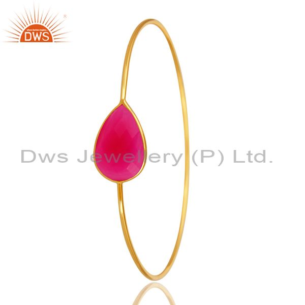 Supplier of Dyed pink chalcedony over brass bangle with 18k yellow gold plated
