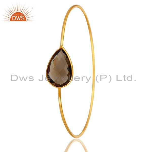 Supplier of 14k gold plated sterling silver faceted smokey quartz sleek bangle