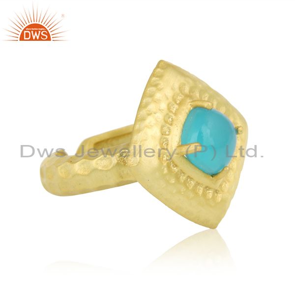 Designer of Hammered handcrafted fashion ring with gold on and aqua chalcedony