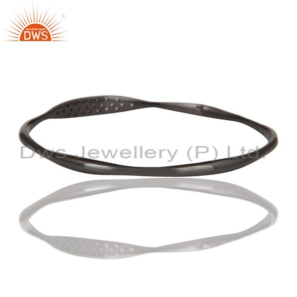 Manufacturer of 18k gold over black oxidized 925 silver white topaz bangle jewelry