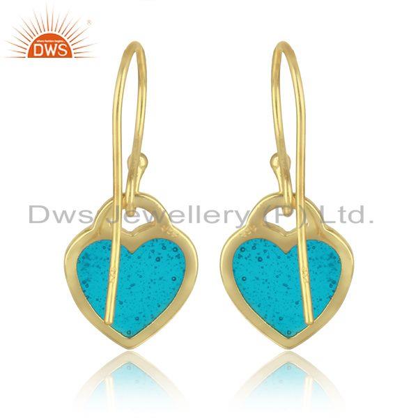Designer of Heart dangle in yellow gold plated silver with light blue enamel