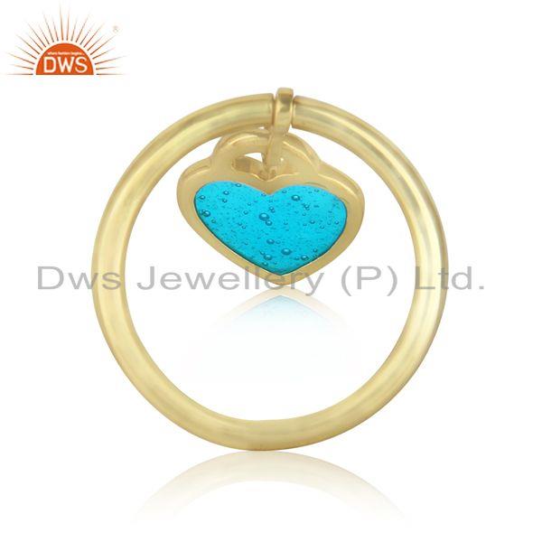 Designer of Dainty ring in yellow gold on silver 925 with light blue enamel