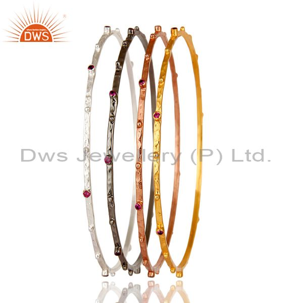Wholesalers of 14k yellow gold brass ruby red cubic zirconia bangles set 4 pieces