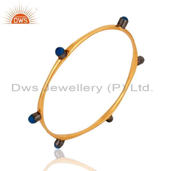 Wholesalers of 18-carat yellow gold plated blue chalcedony gemstone womens bangle