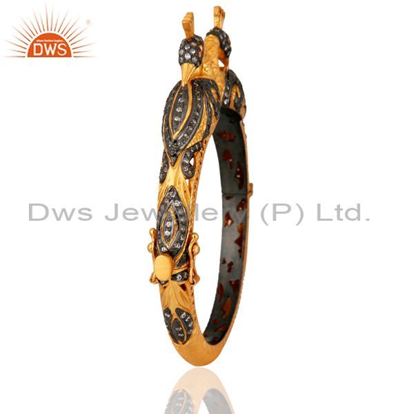 Wholesalers of 22k yellow gold plated silver peacock designer peacock bangle cz