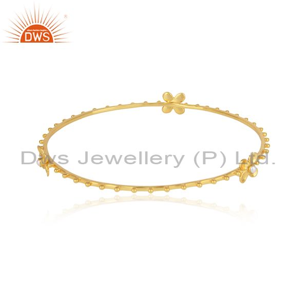 Designer floral silver bangle with 18k yellow gold on and pearl